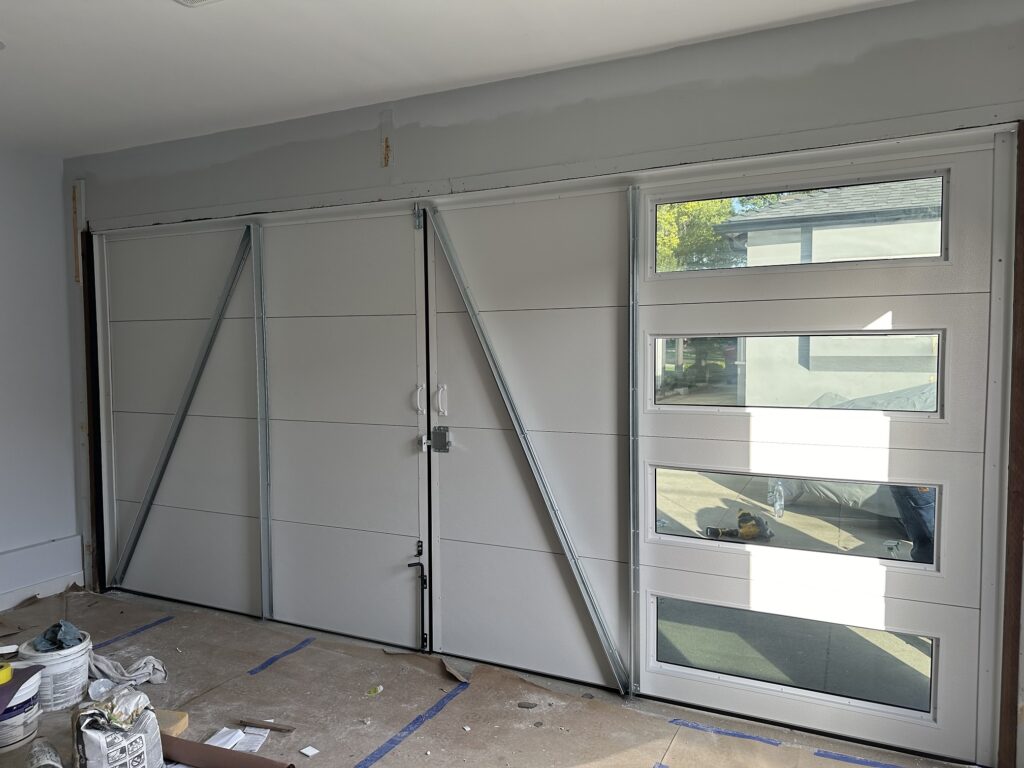 Black Flushed Swing Doors with Tinted Windows